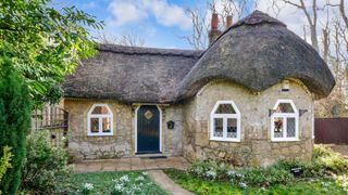 Thatched roof cottage made of stone