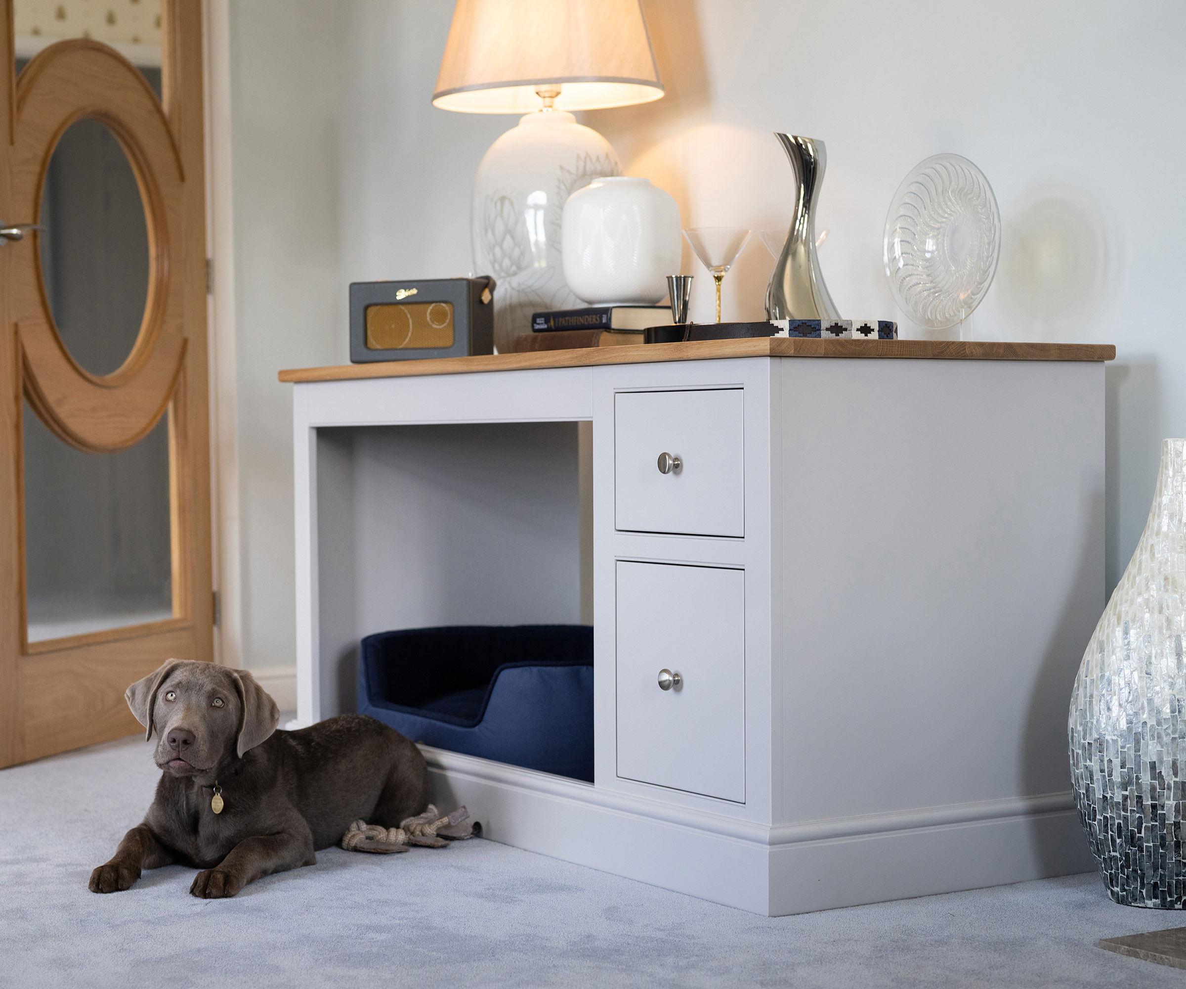grey painted sideboard with built-in dog bed