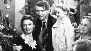 Donna Reed, Jimmy Stewart and Karolyn Grimes in It's a Wonderful Life