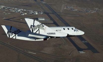 The VSS Enterprise, Richard Bronson's commercial space flight system, competed its first manned glide flight over the Mojave Desert.