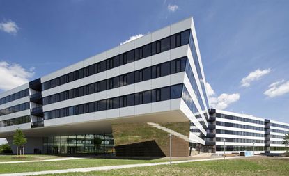 exterior of adidas HQ with multiple storys with a white and glazed exterior