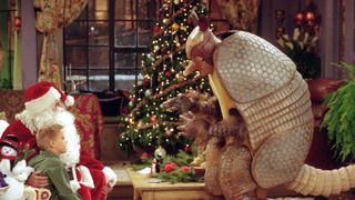 A scene from Friends episode, The One with the Holiday Armadillo Matthew Perry, Cole Sprouse, David Schwimmer