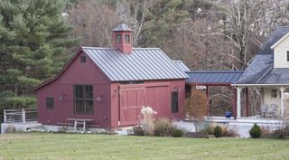 renovated barn exterior and porch on 1700s New England farmhouse