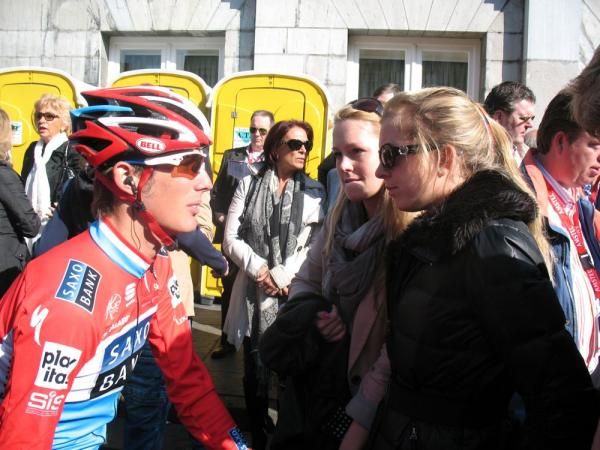 Andy Schleck greets a friend at the start of the Amstel Gold Race in Maastricht