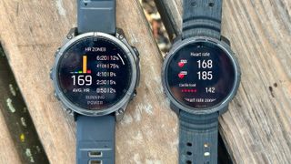 The Polar Vantage M3 and Garmin Fenix 8 sitting side by side, showing similar heart rate averages