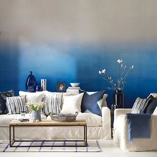 blue living room with ombre effect wall