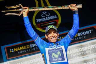 Nairo Quintana (Movistar) lifts the winner's trident on the final Tirreno-Adriatico podium
