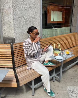 Amaka Hamelijnck 30 Striped Pieces to Buy Now and Wear Forever Casual Outfit Idea Stripe Button Down Adidas Sneakers