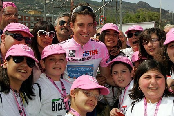The kids enjoy a moment with their hero.