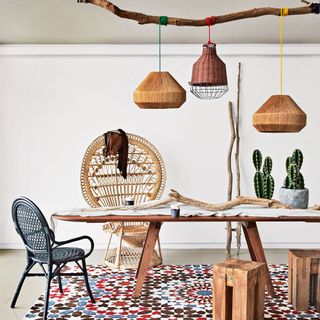 White room with wooden table and lamps