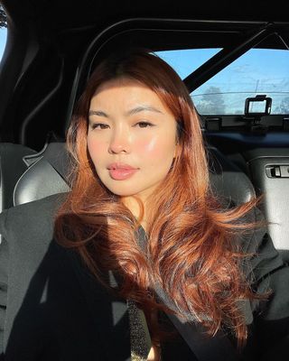 Content creator Allison Ho shows her take on the 'Cowboy Copper' hair color trend