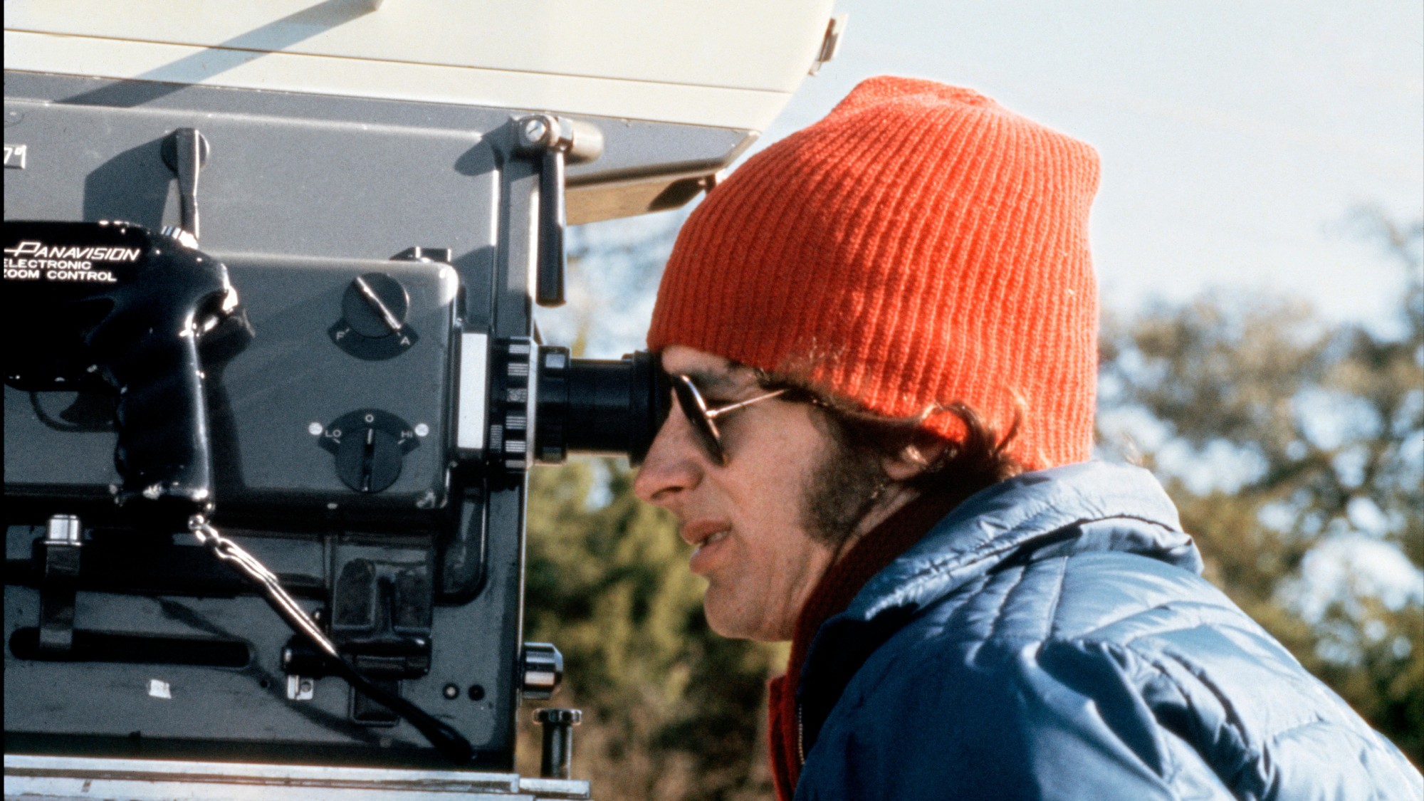 Steven Spielberg looking into the camera on the set of The Sugarland Express