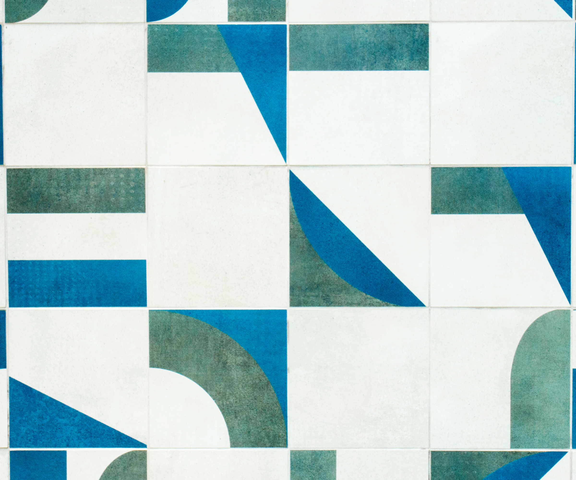 Decorated square tiles in a straight lay pattern