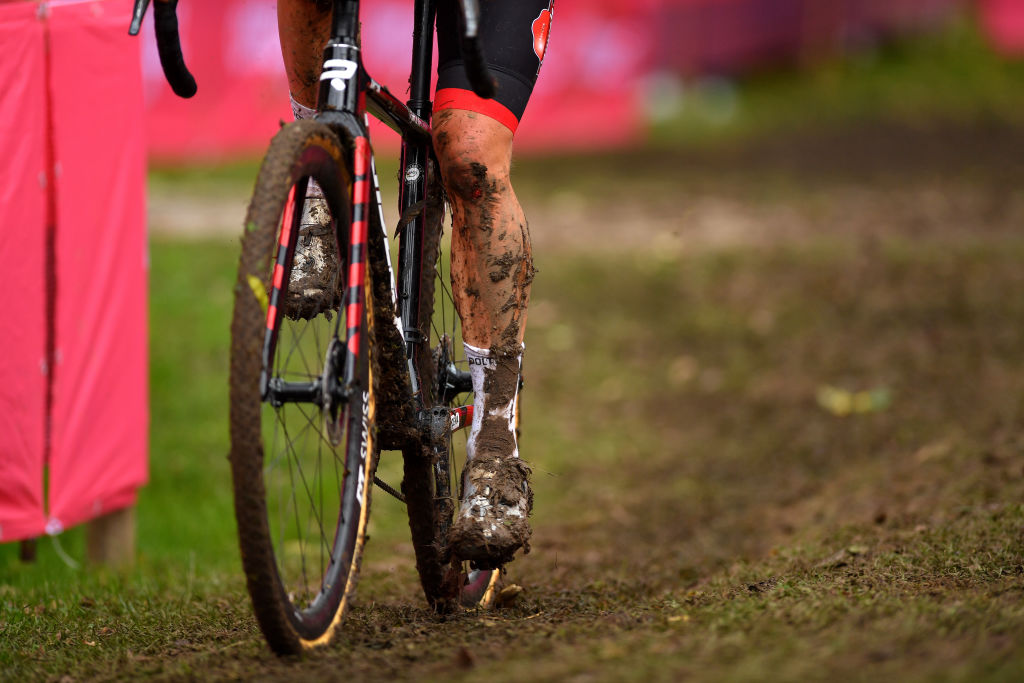 OVERIJSE BELGIUM OCTOBER 31 Detail view of a muddy rider during the 62nd Druivencross Overijse UCI CycloCross Worldcup 2021 Womens Elite DruivencrossOverijse CXWorldCup UCIcyclocrossWC on October 31 2021 in Overijse Belgium Photo by Luc ClaessenGetty Images