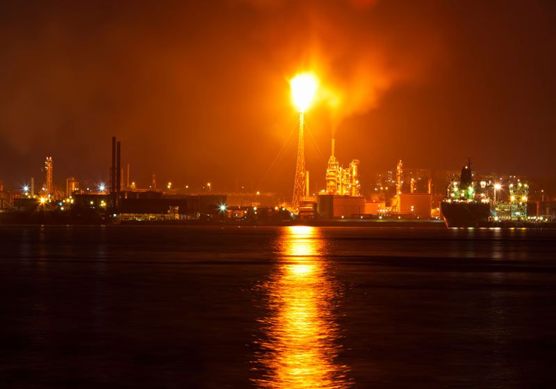 oil refinery at night