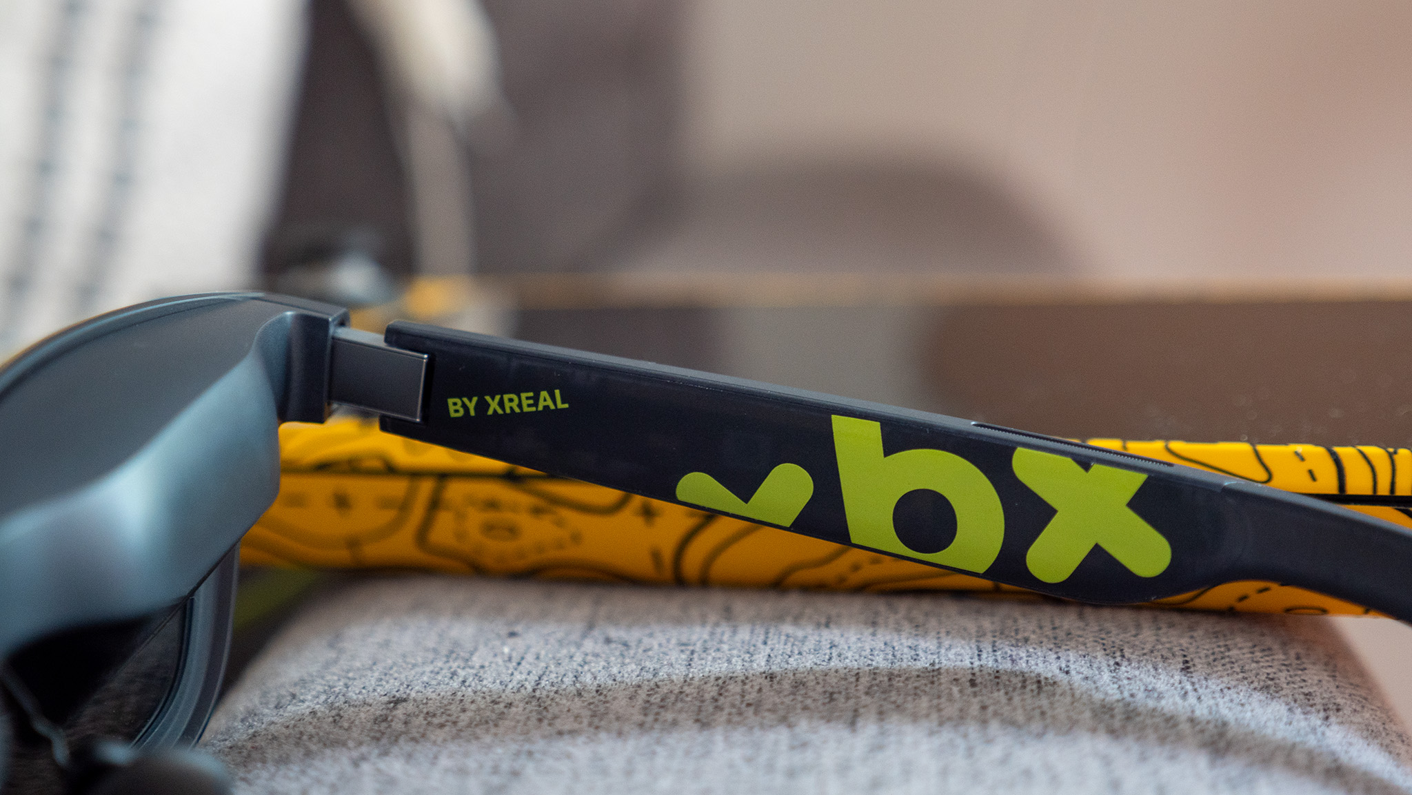 The Xreal XBX logo on the inside of the glasses' right arm