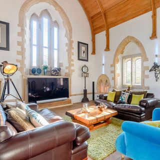 living room with extra ceiling heights