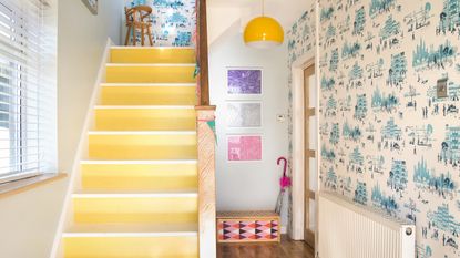 Geese wallpaper in panels in a blue hallway