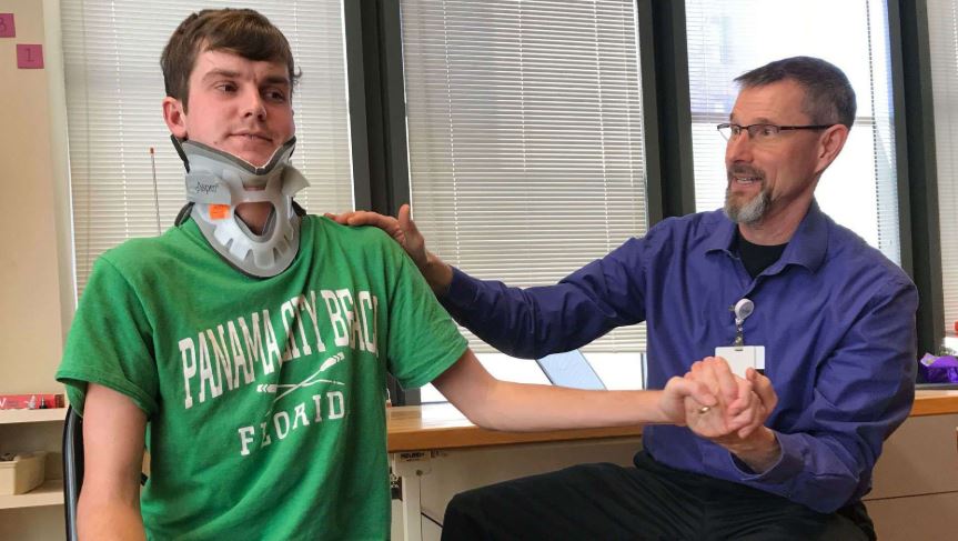 Brock Meister undergoing physical therapy.