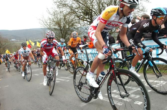 Jelle Vanendert (Lotto Belisol) climbs alongside Richie Porte (Sky)