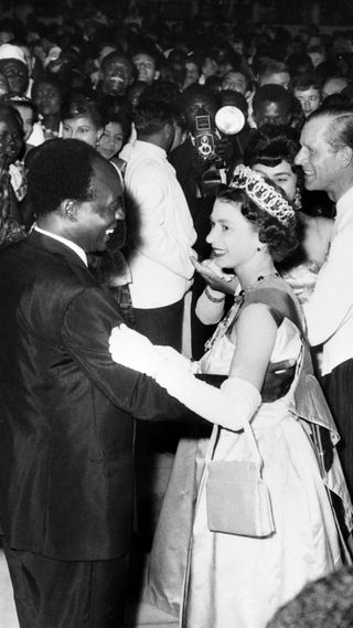 Queen Elizabeth II dancing with Ghana's president