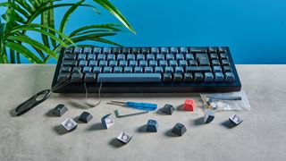 A black and blue Keychron Q7 wired mechanical keyboard that's made of metal