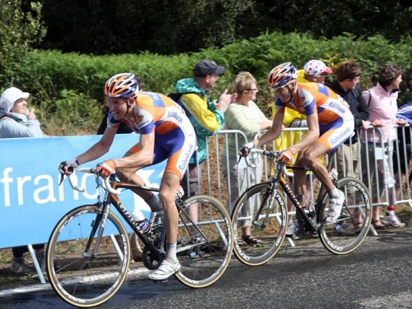 Rabobank's Bauke Mollema brings Robert Gesink to the line.