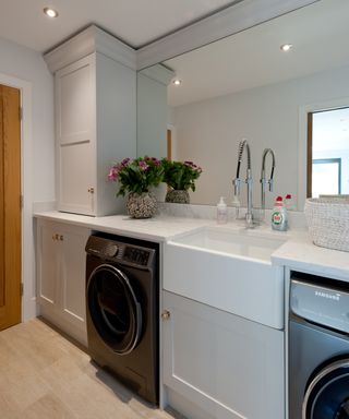 narrow utility room with large mirror