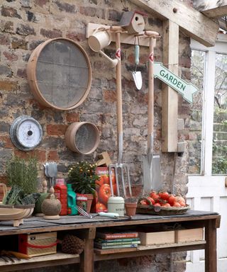 potting bench with hanging tools