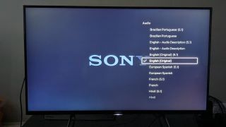 Netflix on a Sony TV in a dark room 3