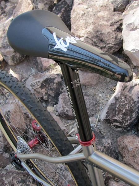 A Tune saddle is perched atop a KCNC aluminum post.