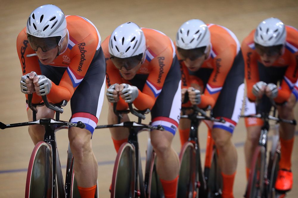 The Netherlands team pursuit squad rounds the V&eacute;lodrome de Saint-Quentin-en-Yvelines.