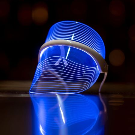a closeup of a lit up led face mask - led face mask black friday 
