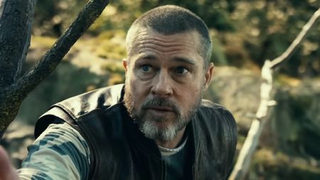 James Belmont in the woods with dog in Heart of the Beast