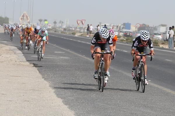 Kirsten Wild (Cervelo TestTeam) is led out for the first intermediate by Sarah Duester.