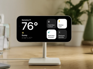 An iPhone on a docking stand with StandBy enabled