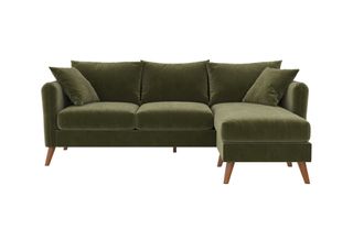A green velvet chaise sectional sofa