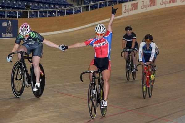 Dana Feiss celebrates the Women's Keirin win with Cristin Walker