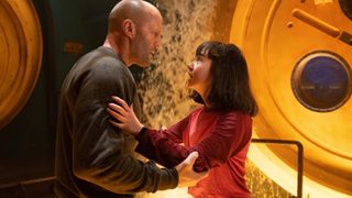 Jason Statham as Jonas and Shuya Sophia Cai as Meiying in Meg 2: The Trench