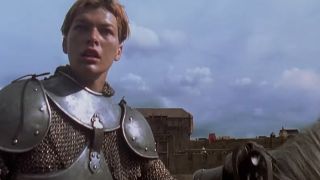 Milla Jovovich in armor as Joan of Arc in The Messenger: The Story of Joan of Arc