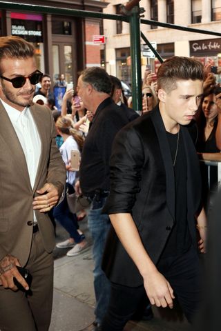 David Beckham And Brooklyn Beckham At Fashion Week