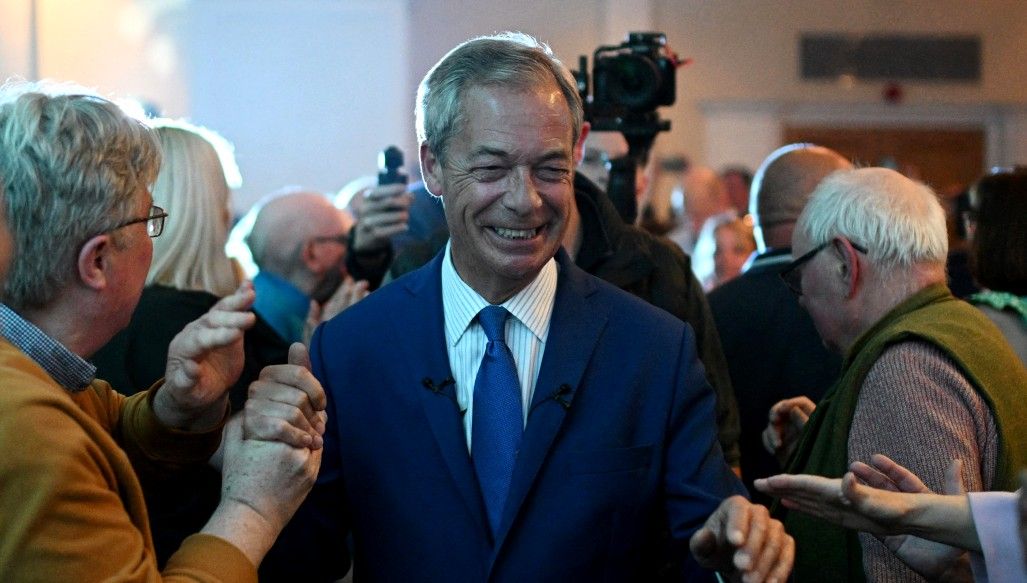 Nigel Farage is greeted by supporters