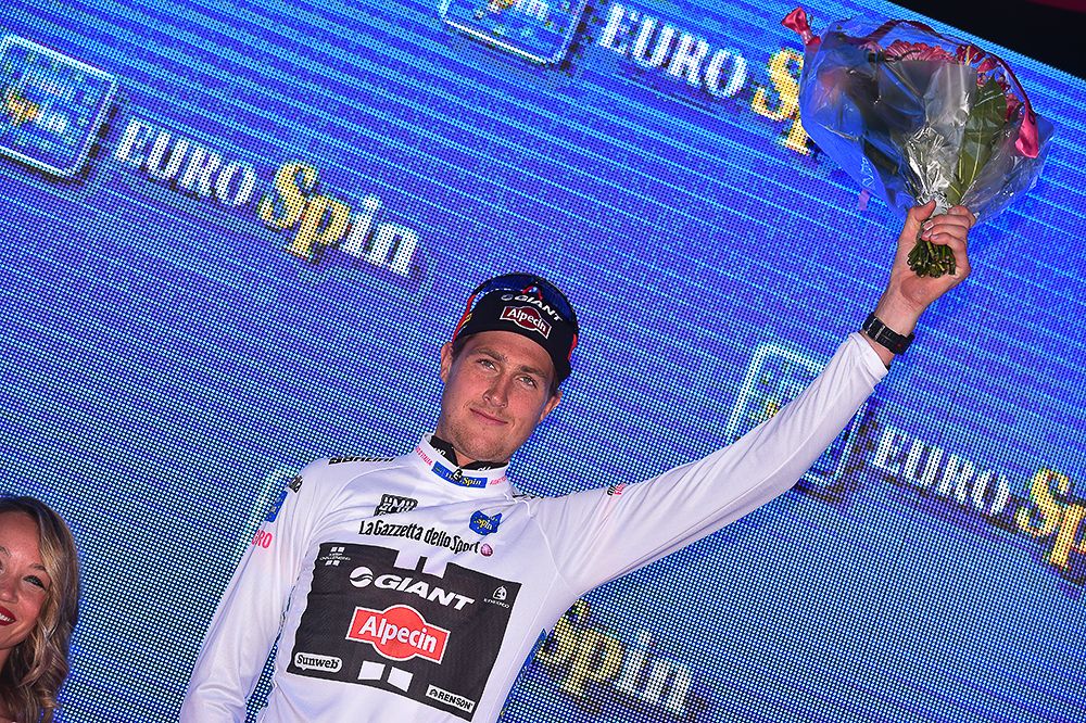 Tobias Ludvigsson in the white jersey on the Giro's stage 1 podium