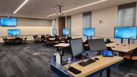 A classroom at Thunderbird School in Phoenix outfitted with Biamp collaboration technology. 