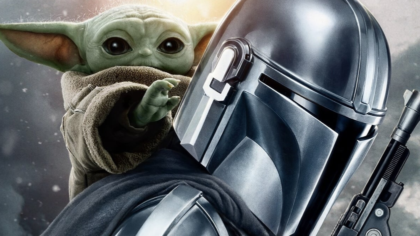  a helmeted sci-fi warrior and a green baby alien
