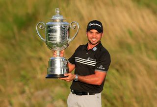 Jason Day holds the Wanamaker trophy