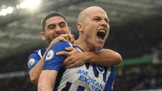 Aaron Mooy of Brighton & Hove Albion celebrates with Neal Maupay after scoring his teams second goal during the Premier League match between Brighton & Hove Albion and AFC Bournemouth 