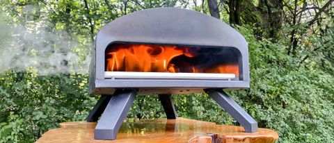 Bertello Outdoor Pizza Oven with flame outside