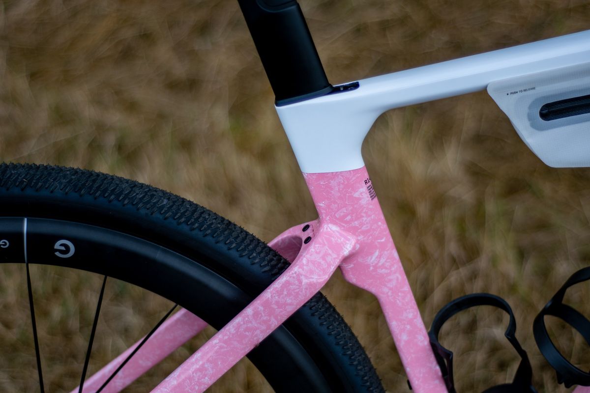 A Canyon Grail CF SLX 8 in the 'strawberry shake' colour