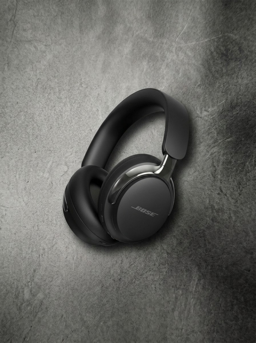Luxury home office gear on a textured slate grey background